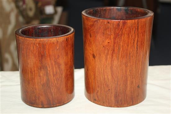 Two Chinese graduated huang huali brush pots, 18th century, 12.5cm and 15.2cm